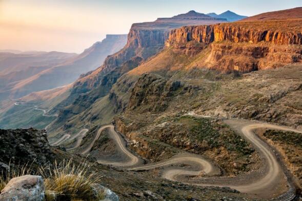 Travel to Lesotho. The winding Sani Pass dirt road between South Africa and Lesotho